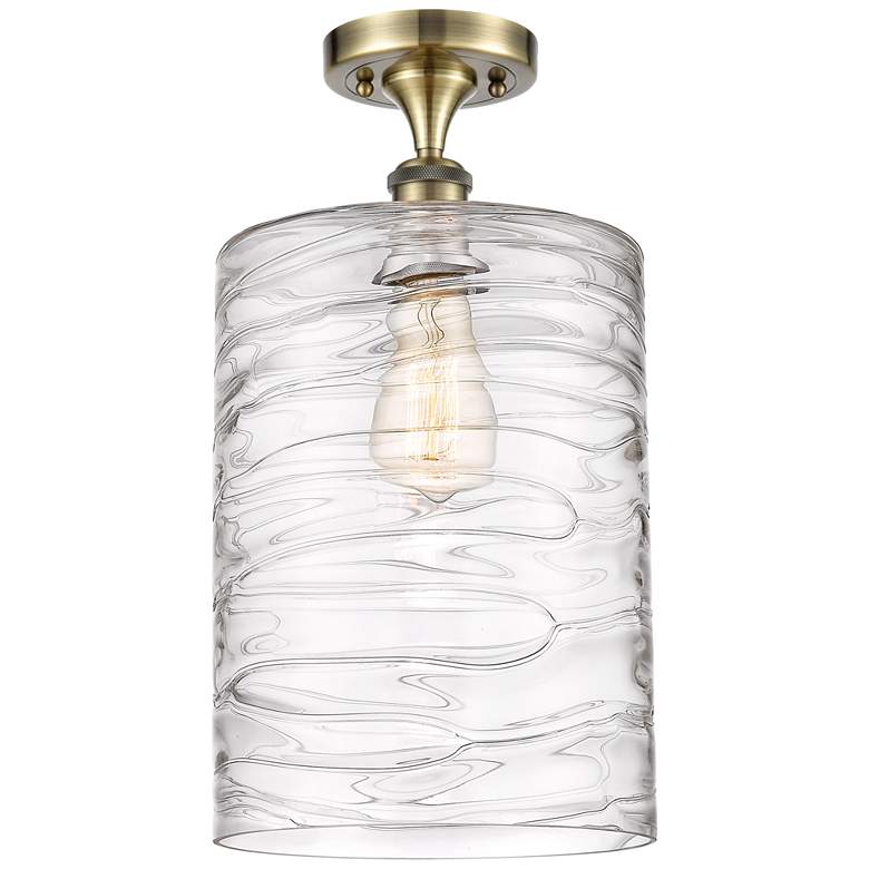 Image 1 Cobbleskill  9" Semi-Flush Mount - Antique Brass - Deco Swirl Shade