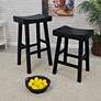 5_Colborn 25" Antique Black Wood Saddle Counter Stool more views