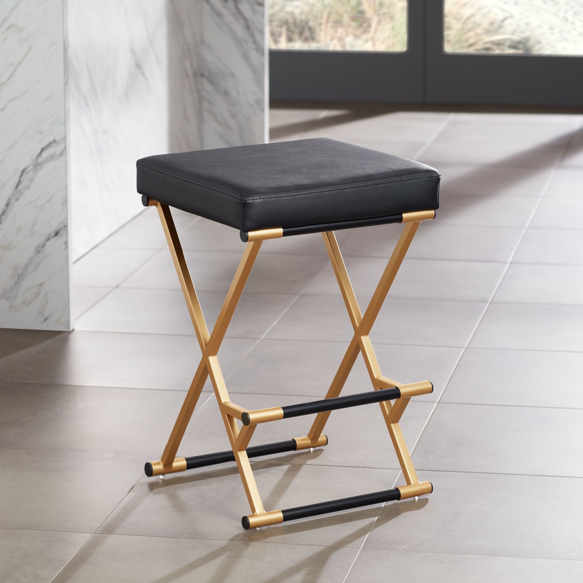 Collier 25" Black Faux Leather Counter Stools Set of 2 in scene