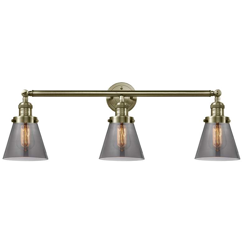 Image 1 Cone 3 Light 30" Bath Light - Antique Brass - Plated Smoke Shade