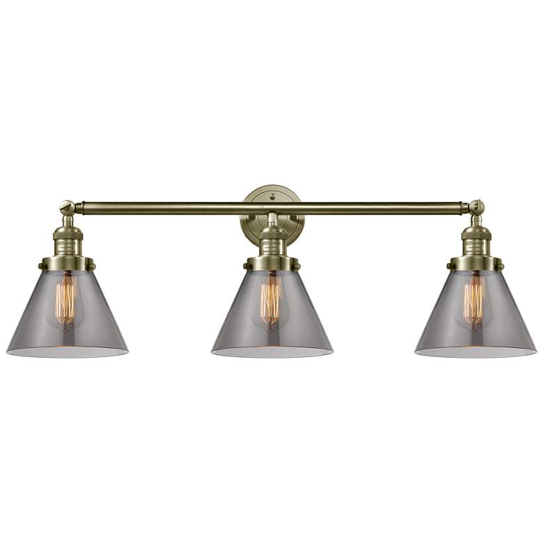 Image 1 Cone 3 Light 32" Bath Light - Antique Brass - Plated Smoke Shade