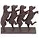 Conga Line Canines 9" High Rust Tabletop Sculpture