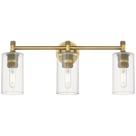 Crown Point 24" Wide 3 Light Brushed Brass Bath Light With Clear Shade Crown Point 24" Wide 3 Light Brushed Brass Bath Light With Clear Shade