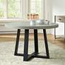Cyrus 47 1/4"W Gray Lava Stone and Iron Round Dining Table in scene