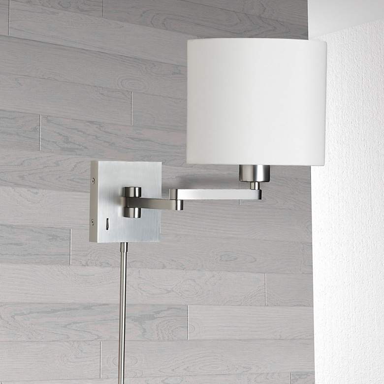 Image 1 Dainolite 12" High Satin Chrome Swing Arm Wall Sconce With White Drum