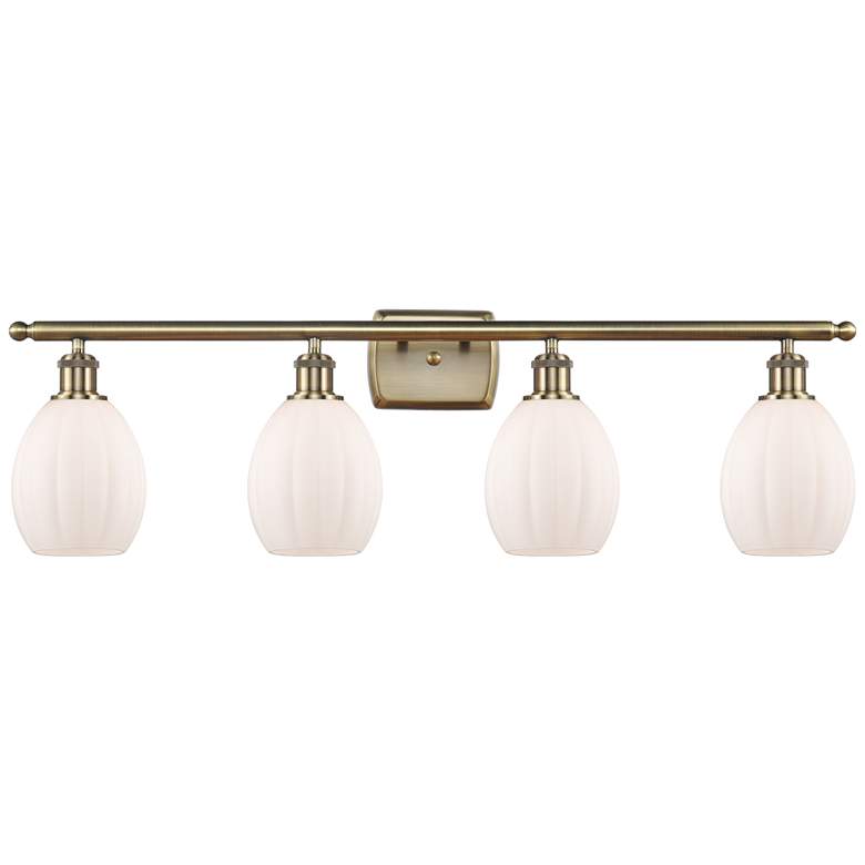 Image 1 Eaton 36" Wide 4 Light Antique Brass Bath Vanity Light w/ Matte White