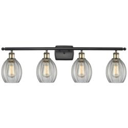 Eaton 36" Wide 4 Light Black Brass Bath Vanity Light w/ Clear Shade