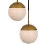 Eclipse 5 Lts Brass Pendant With Frosted White Glass in scene