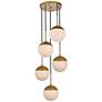 Eclipse 5 Lts Brass Pendant With Frosted White Glass in scene
