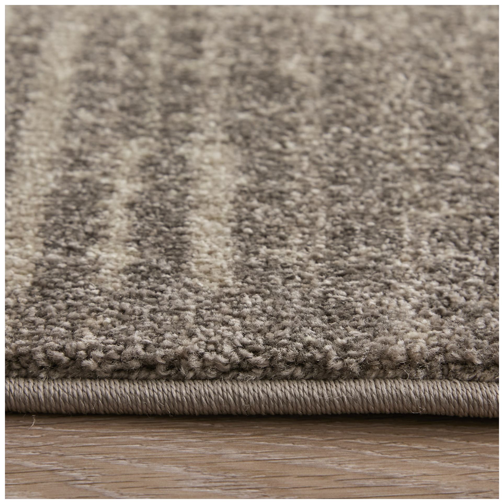 Eden Abstract Indoor Ivory Area Rug 39QPF 6'-4" x 9'-2"