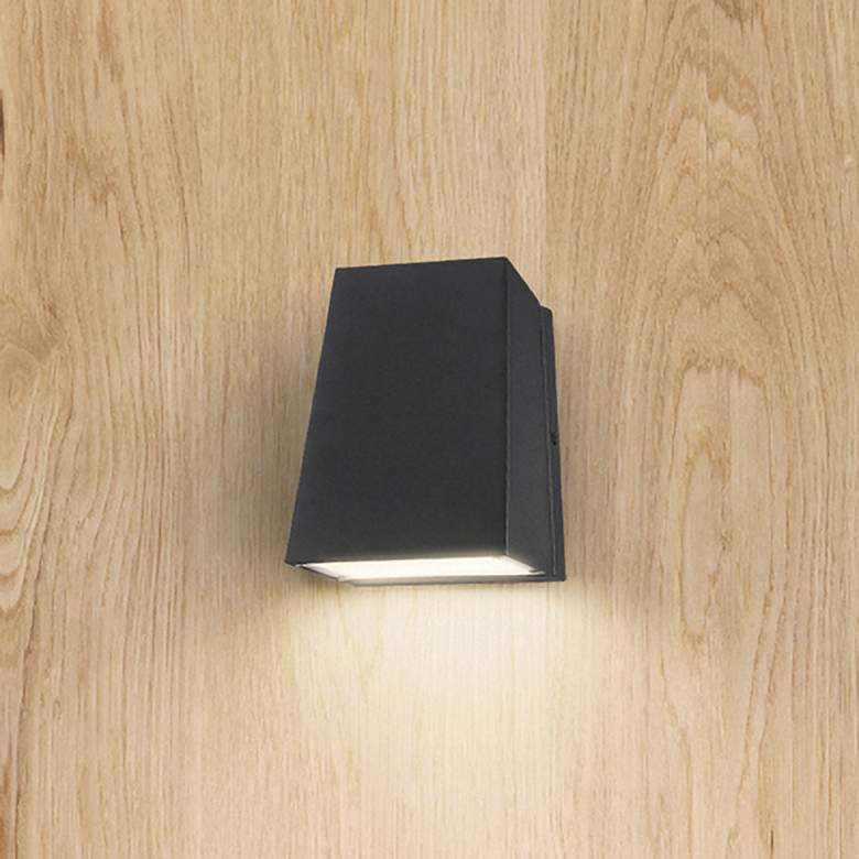 Image 1 Edge 7 1/4" High Black Metal LED Outdoor Wall Light