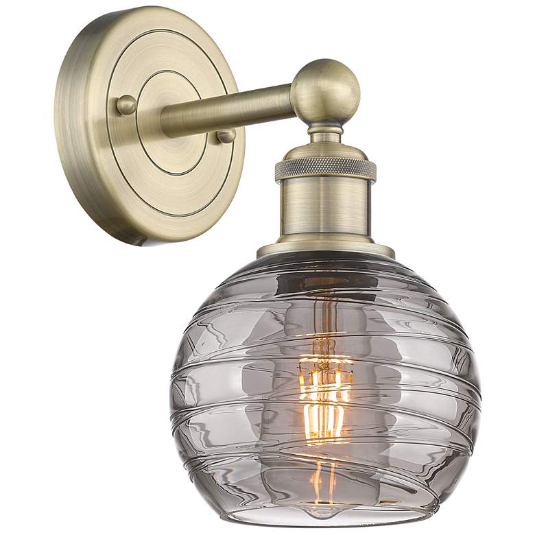 Image 1 Edison Athens 10.38"H Antique Brass Sconce w/ Light Smoke Deco Swirl S