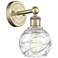 Edison Athens 10.5"High Antique Brass Sconce With Clear Deco Swirl Sha