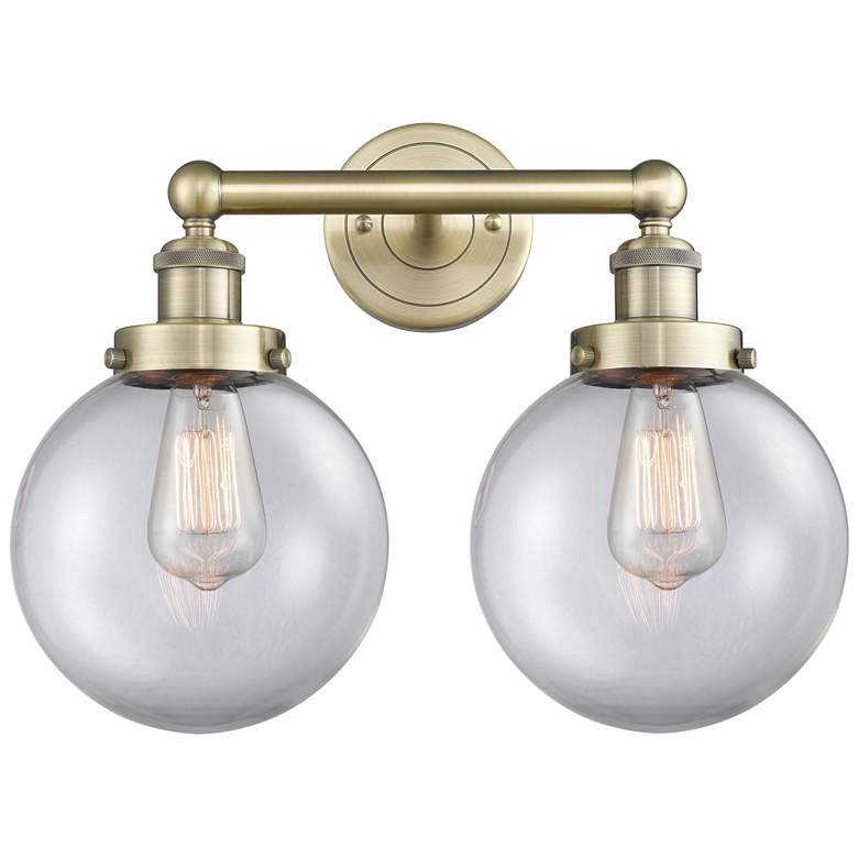 Image 1 Edison Beacon 15.5 inchW 2 Light Antique Brass Bath Light With Clear Shade