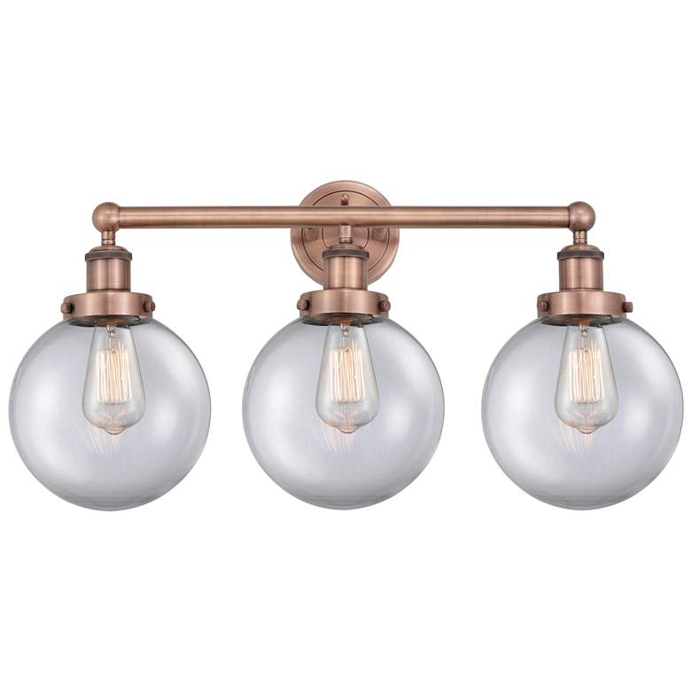 Image 1 Edison Beacon 24.5"W 3 Light Antique Copper Bath Light With Clear Shad