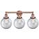 Edison Beacon 24.5"W 3 Light Antique Copper Bath Light With Clear Shad