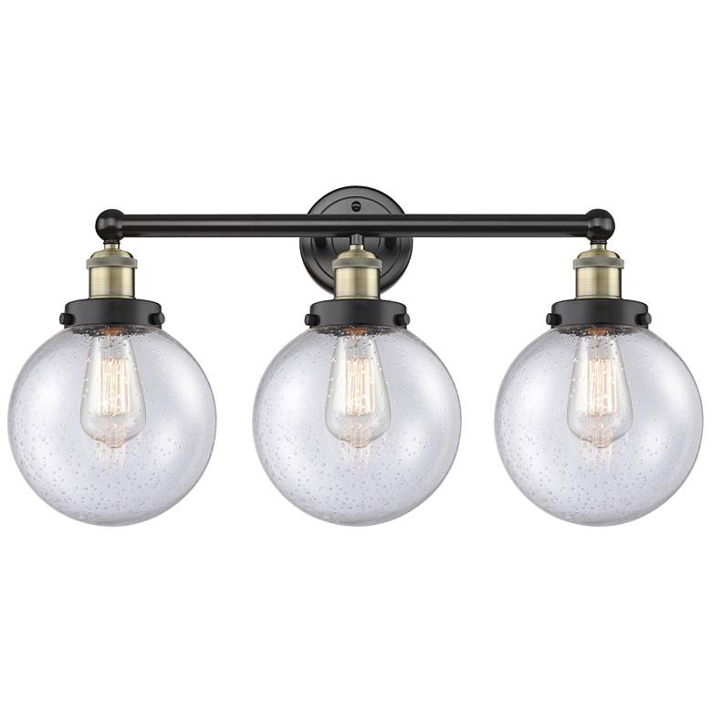 Image 1 Edison Beacon 24.5"W 3 Light Black Brass Bath Light With Seedy Shade