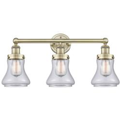 Edison Bellmont 24.5"W 3 Light Antique Brass Bath Light With Clear Sha