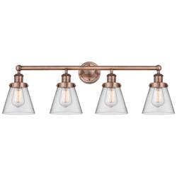 Edison Cone 33.5"W 4 Light Antique Copper Bath Light With Clear Shade