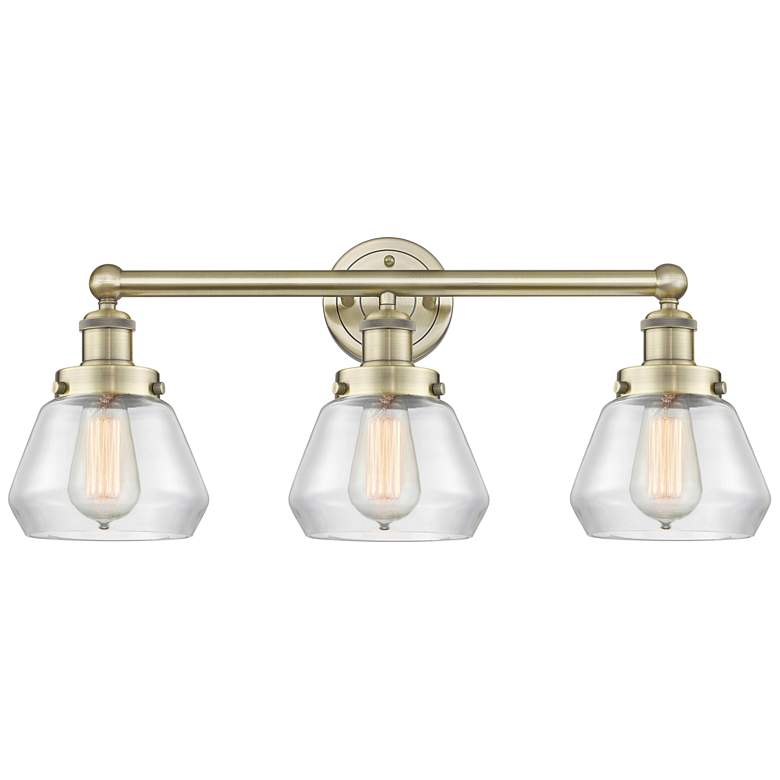 Image 1 Edison Fulton 24.5"W 3 Light Antique Brass Bath Light With Clear Shade