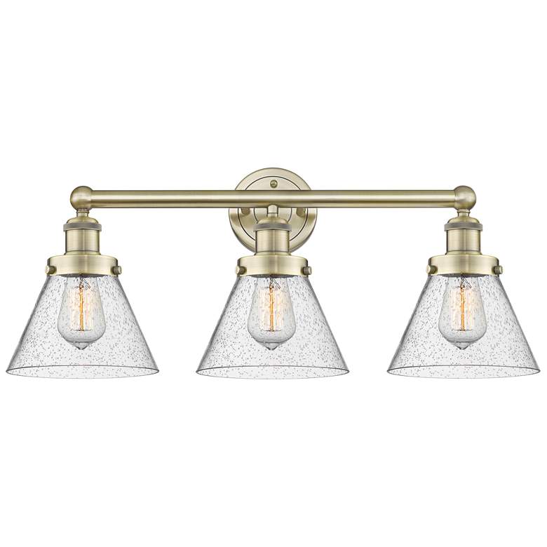 Image 1 Edison Large Cone 24.5"W 3 Light Antique Brass Bath Light With Seedy S