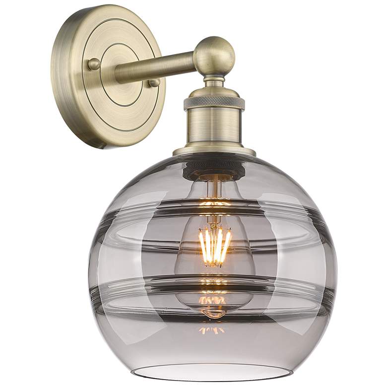 Image 1 Edison Rochester 12.13" High Antique Brass Sconce With Light Smoke Sha