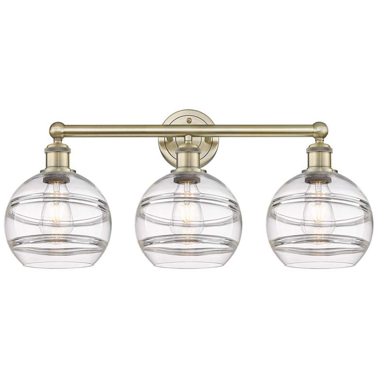 Image 1 Edison Rochester 26" Wide 3 Light Antique Brass Bath Light With Clear