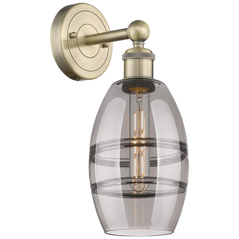Image 1 Edison Vaz 10.38" High Antique Brass Sconce With Light Smoke Shade