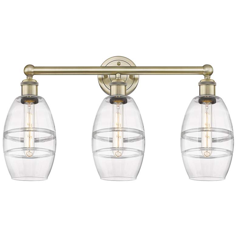 Image 1 Edison Vaz 23.88" Wide 3 Light Antique Brass Bath Light With Clear Sha