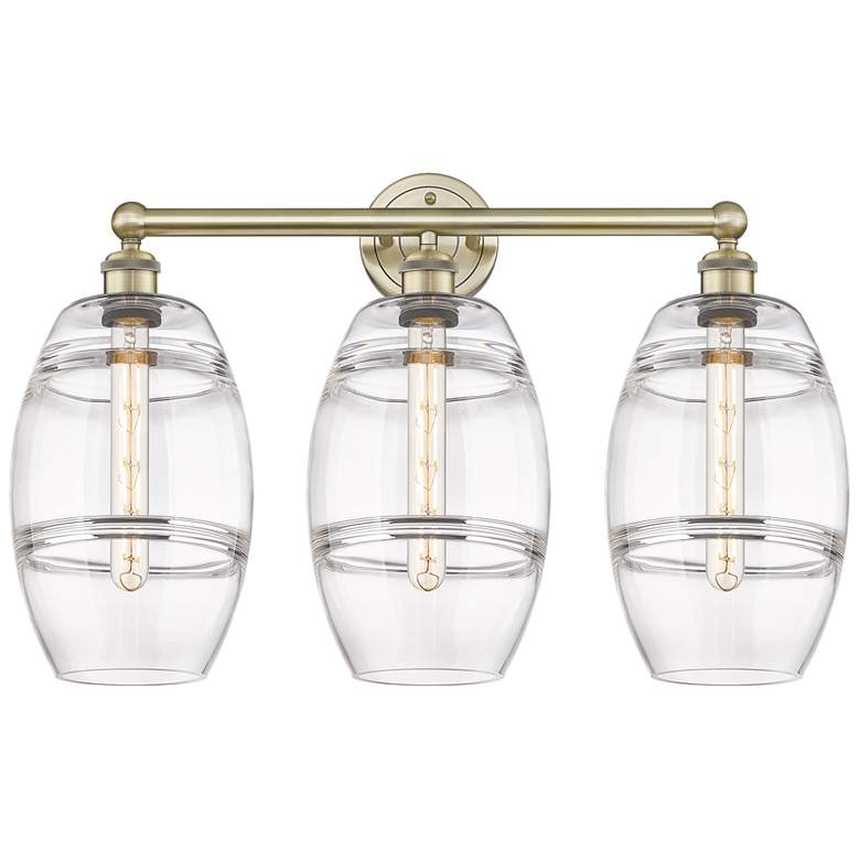 Image 1 Edison Vaz 26" Wide 3 Light Antique Brass Bath Light With Clear Shade