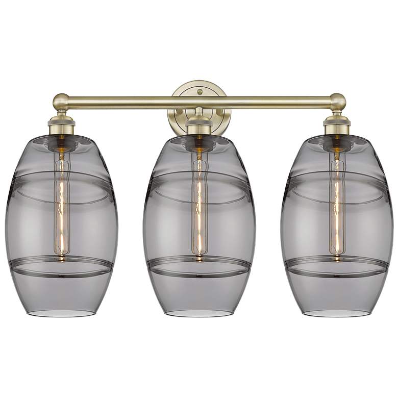 Image 1 Edison Vaz 26" Wide 3 Light Antique Brass Bath Light With Light Smoke