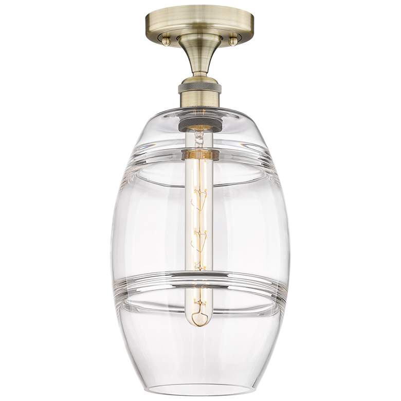 Image 1 Edison Vaz 8" Wide Antique Brass Semi-Flush Mount With Clear Shade