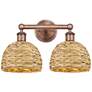 1_Edison Woven Rattan 17" Wide 2 Light Antique Copper Vanity Light With
