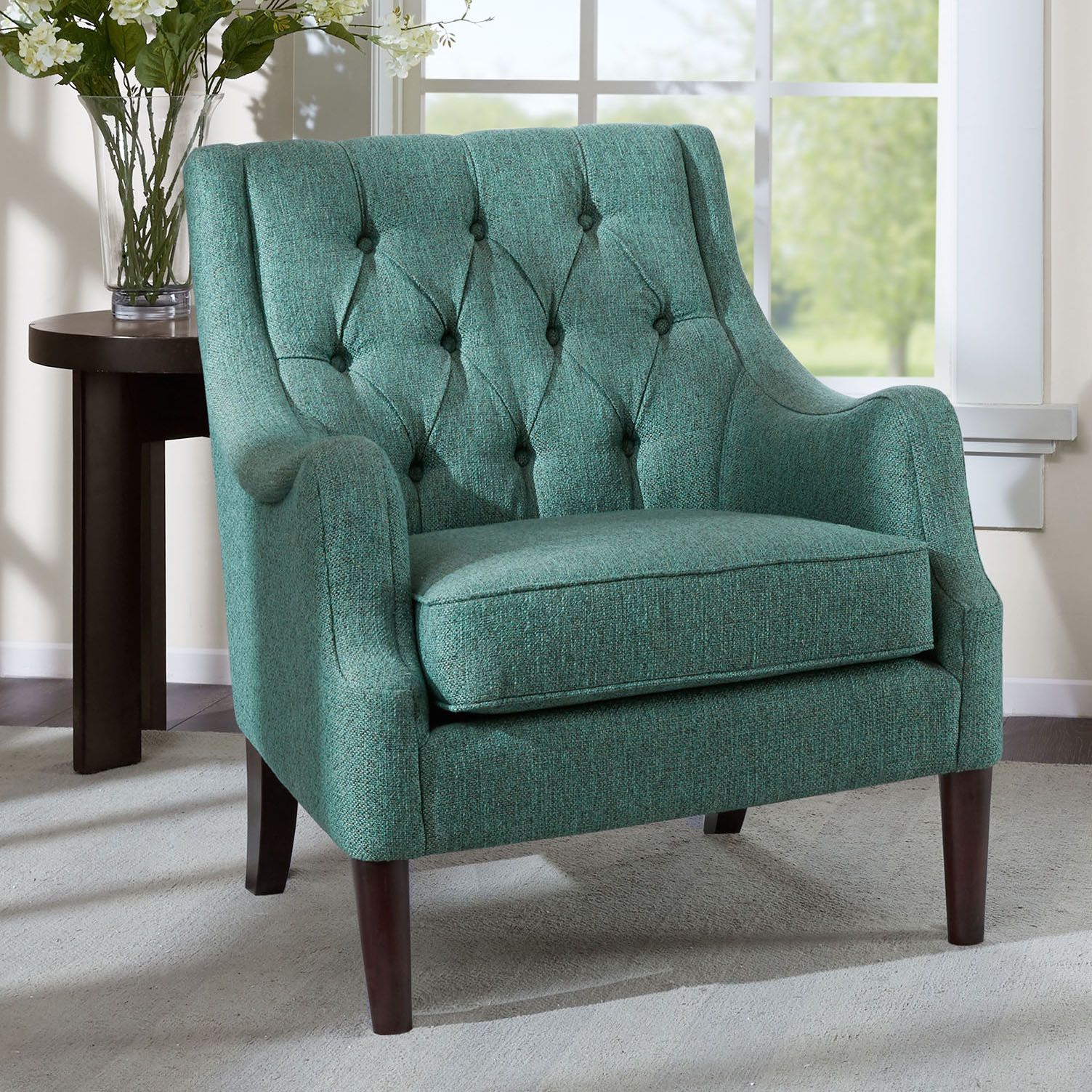 teal tufted chair