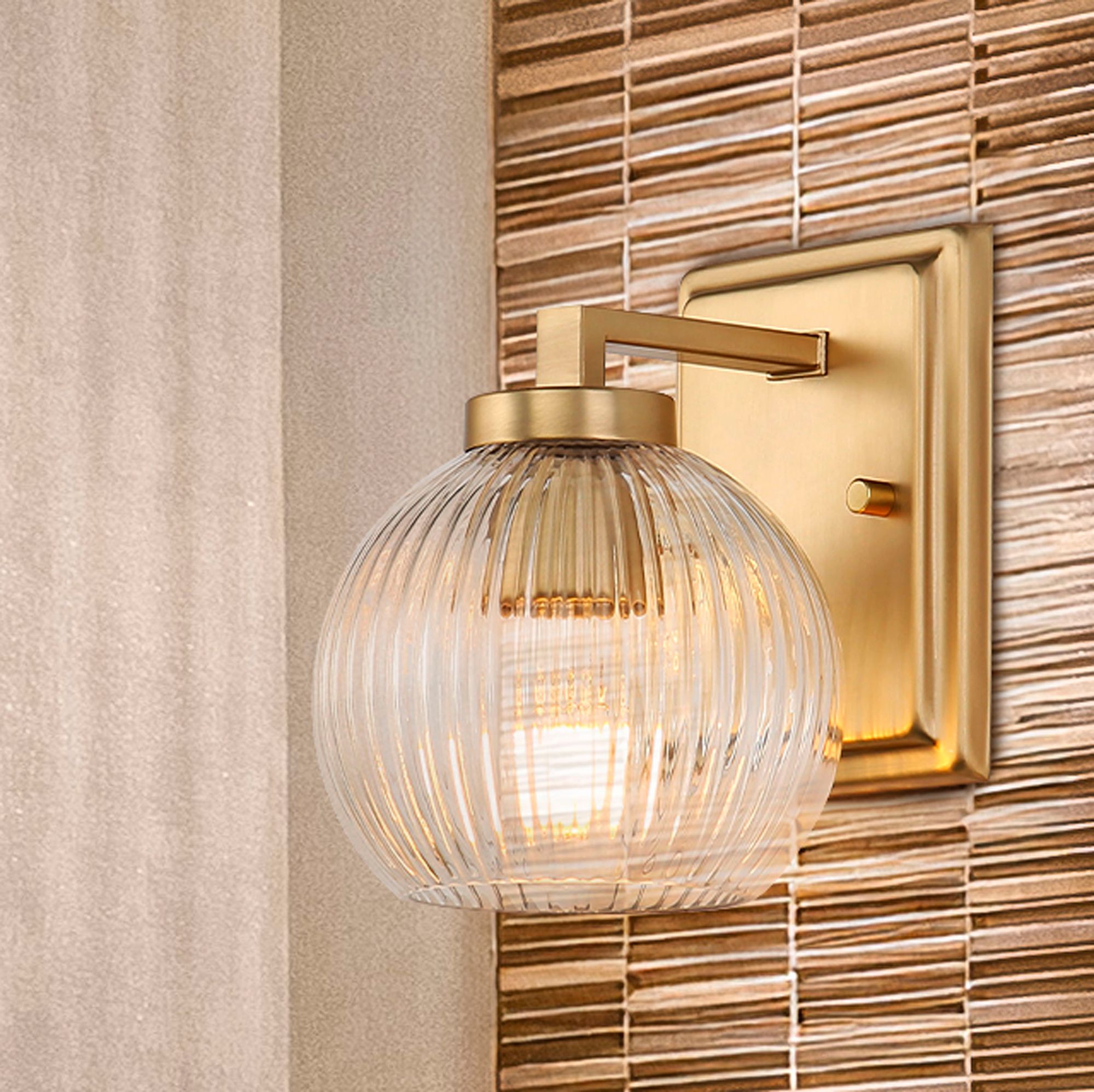 Elliott 1-Light Vanity Light in Brushed Cham Bronze with Ribbed Clear Shade