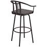 Elm Lane Lael 25 1/4" High Black Metal and Wood Swivel Counter Stool in scene