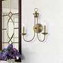 Estate 2 Light Antique Brass Double Sconce in scene