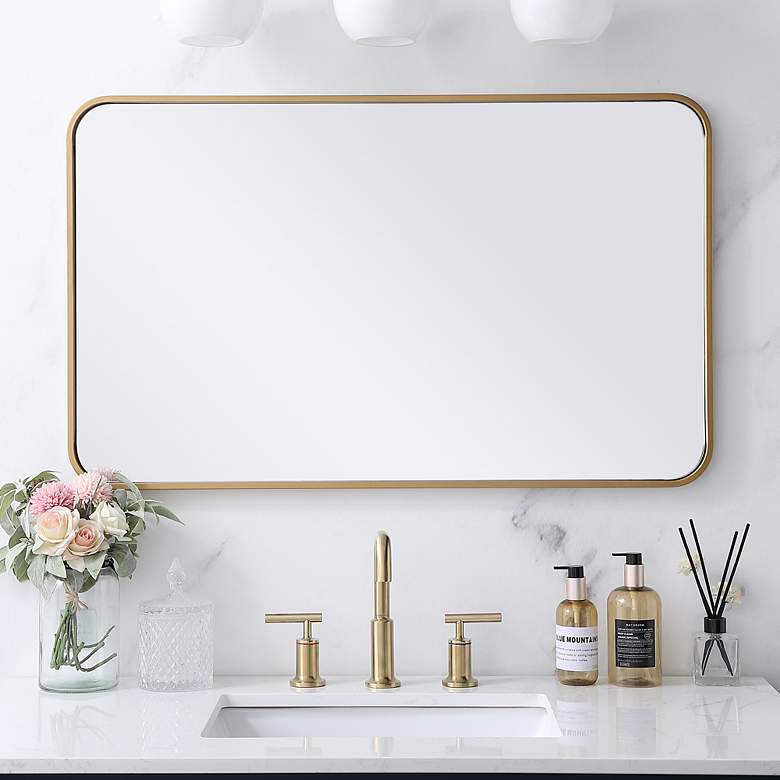 Image 1 Evermore Brass Metal 22" x 36" Rectangular Wall Mirror