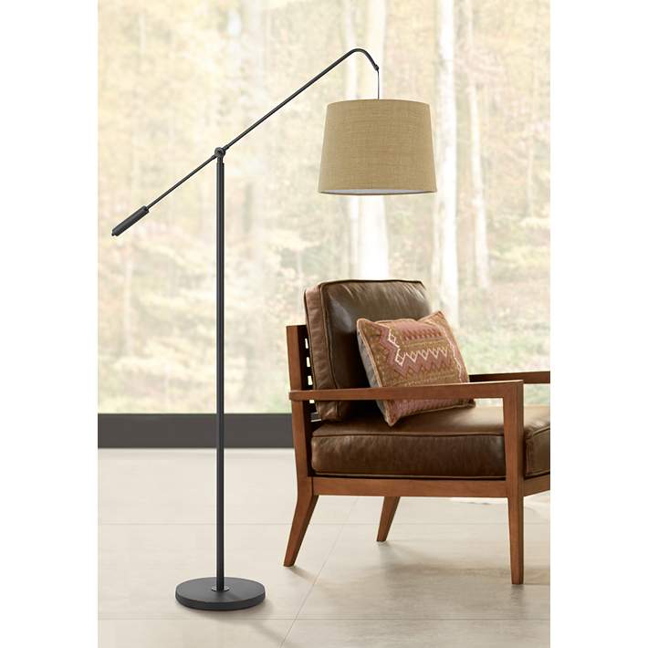 https://image.lampsplus.com/is/image/b9gt8/fishing-rod-dark-bronze-adjustable-task-floor-lamp__098f2cropped.jpg?qlt=65&wid=710&hei=710&op_sharpen=1&fmt=jpeg