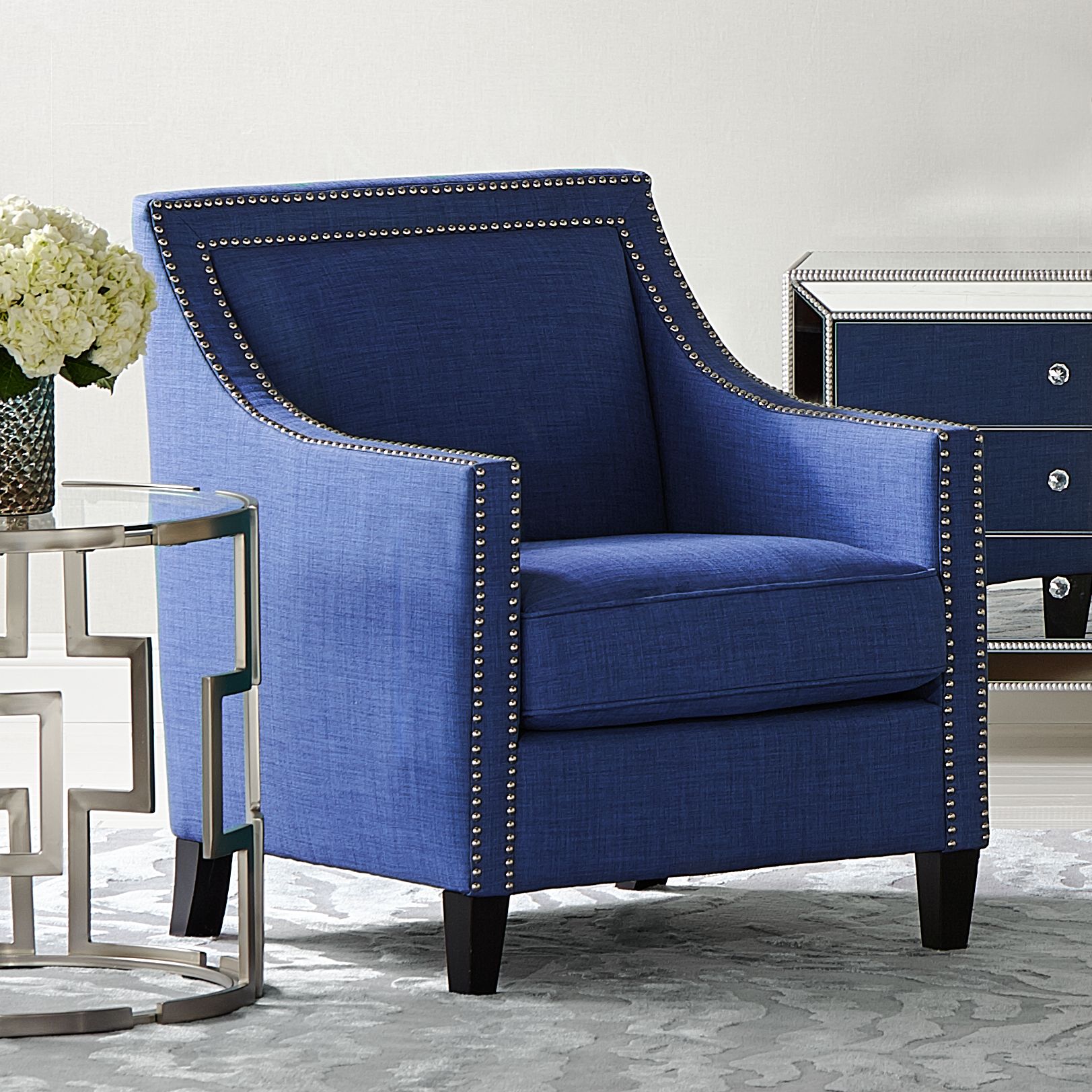 blue studded armchair