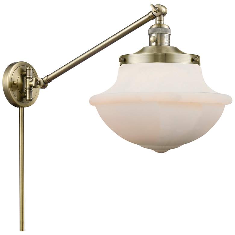 Image 1 Franklin Oxford 13" High Antique Brass Swing Arm w/ Matte White Shade