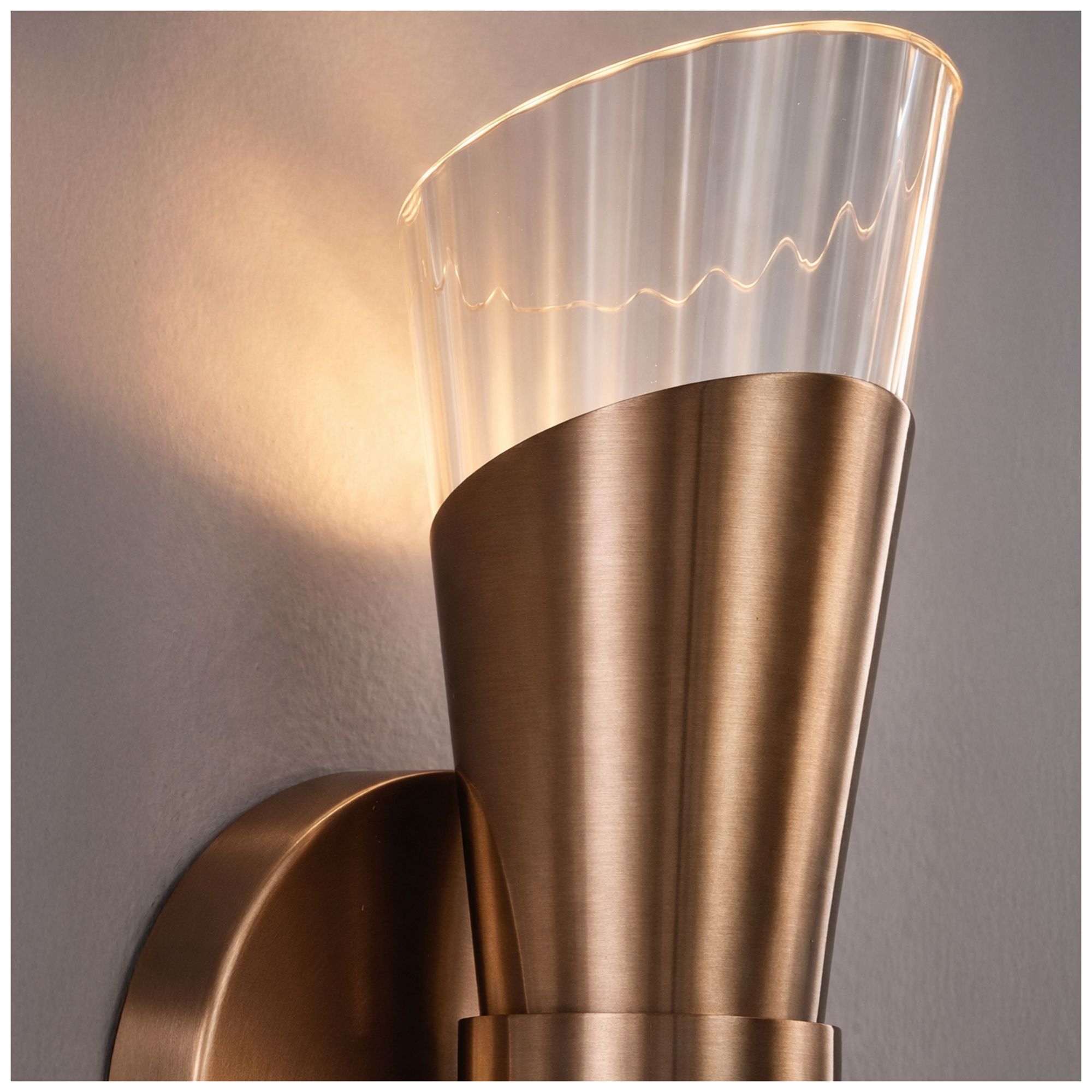 Fusion Lugano 8.75" High Brushed Brass, Ribbed Clear LED Wall Sconce
