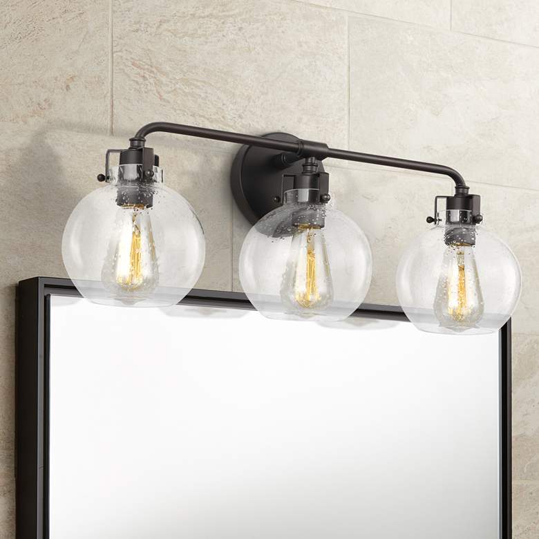 Image 1 Generation Lighting Clara 24" Oil-Rubbed Bronze 3-Light Bath Light
