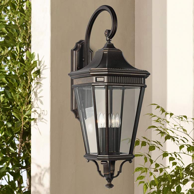 Image 1 Generation Lighting Cotswold Lane 36 1/4" Bronze and Glass Wall Light