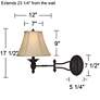 Godia Bronze Oval Plug-In Swing Arm Wall Lamp in scene