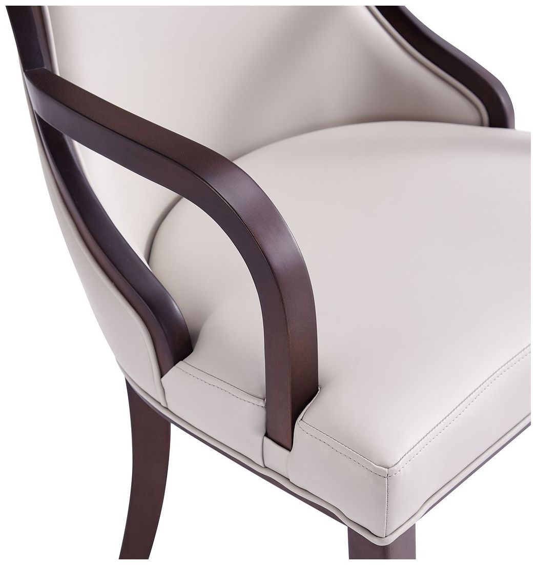 Grand Light Gray Faux Leather Dining Armchair in scene