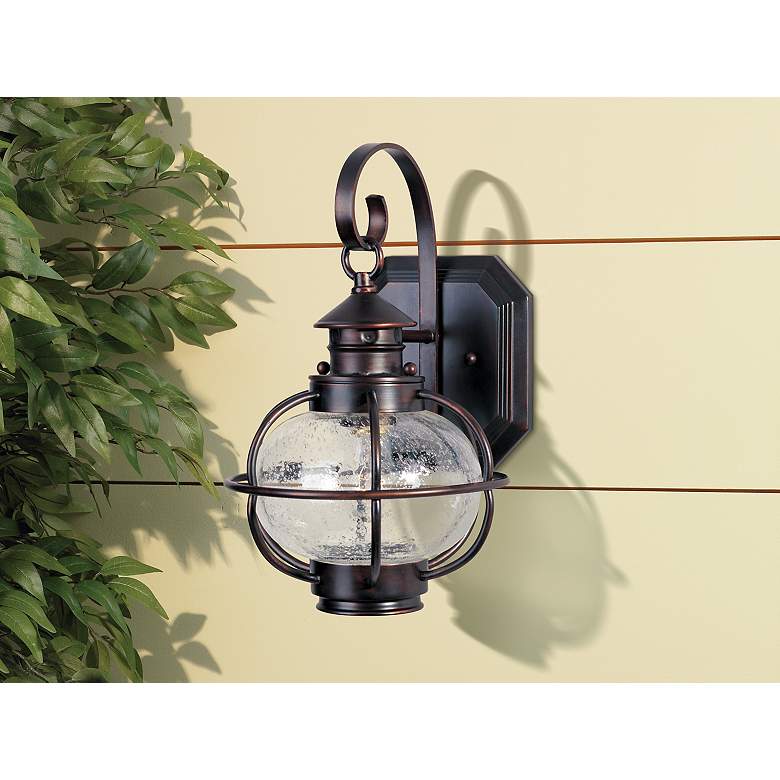 Image 1 Maxim Nautington 13 inch High Bronze and Seeded Glass Outdoor Wall Lantern in scene