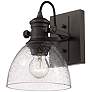 2_Hines 6 7/8" Wide Rubbed Bronze 1-Light Wall Sconce with Seeded Glass