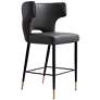 Holguin 23 1/2" Gray Tufted Faux Leather Counter Stool in scene