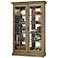 Howard Miller Clawson II Aged Natural 2-Door Display Cabinet